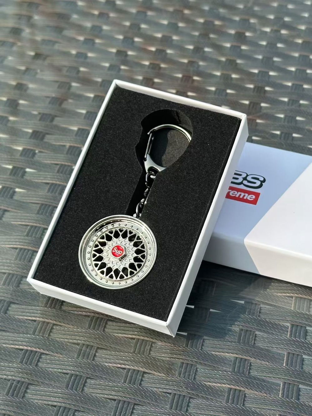 Supreme Silver Wheel Keychain with Red Logo Center